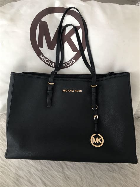 michael kors tas letter er af gevallen|michael kors fragrance warranty.